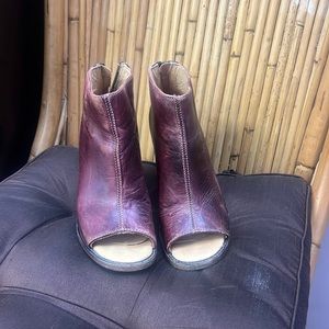 open toed thick heeled boots.